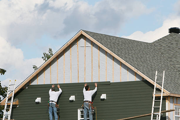 Professional Siding Installation technician working in Cable, OH